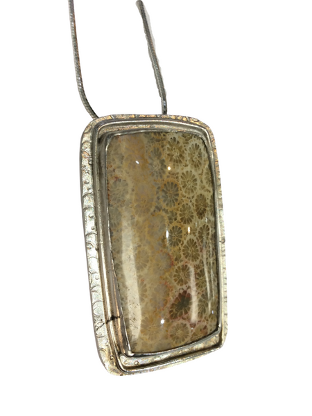 FOSSILIZED CORAL WITH TEXTURED FRAME PENDANT