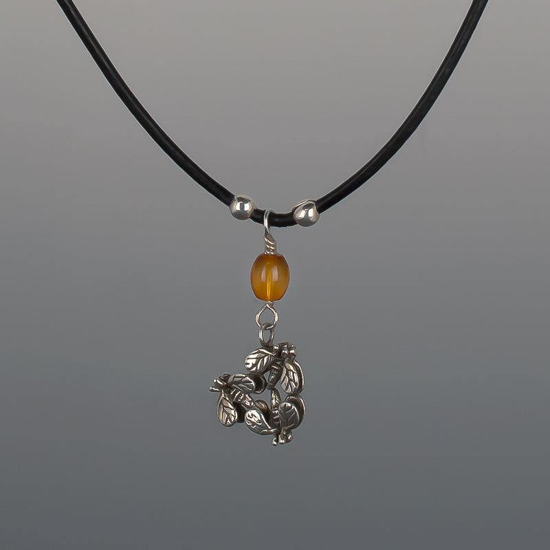 BUZZZ-B PENDANT AMBER ON LEATHER CHAIN
