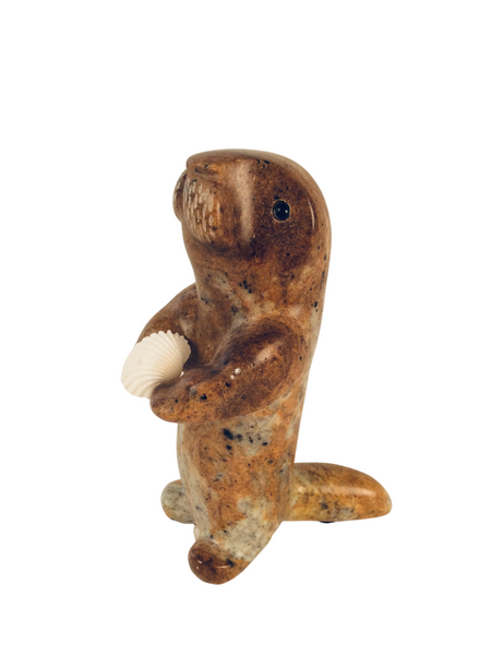OTTER STANDING WITH SHELL