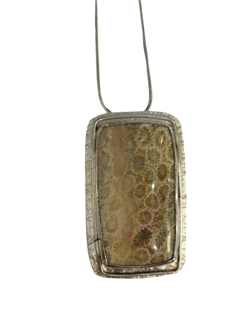 FOSSILIZED CORAL WITH TEXTURED FRAME PENDANT