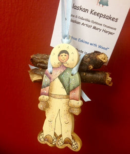 SNOWSHOE ESKIMO WITH WOOD ORNAMENT