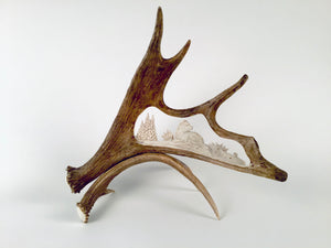 RELAXING WOLF STANDING CARVED MOOSE ANTLER