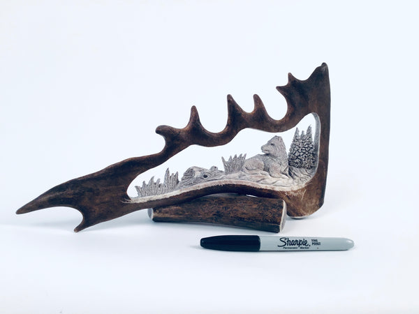 CARVED CARIBOU SHOVEL WOLF