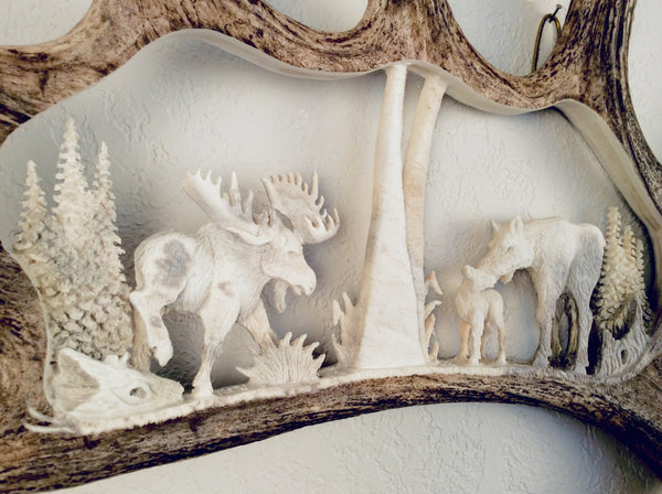 MOOSE FAMILY HANGING ANTLER CARVING