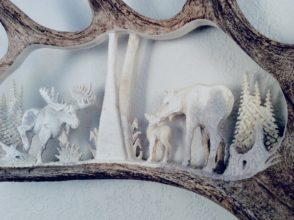 MOOSE FAMILY HANGING ANTLER CARVING