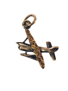 PLANE CHARM WITH NUGGETS