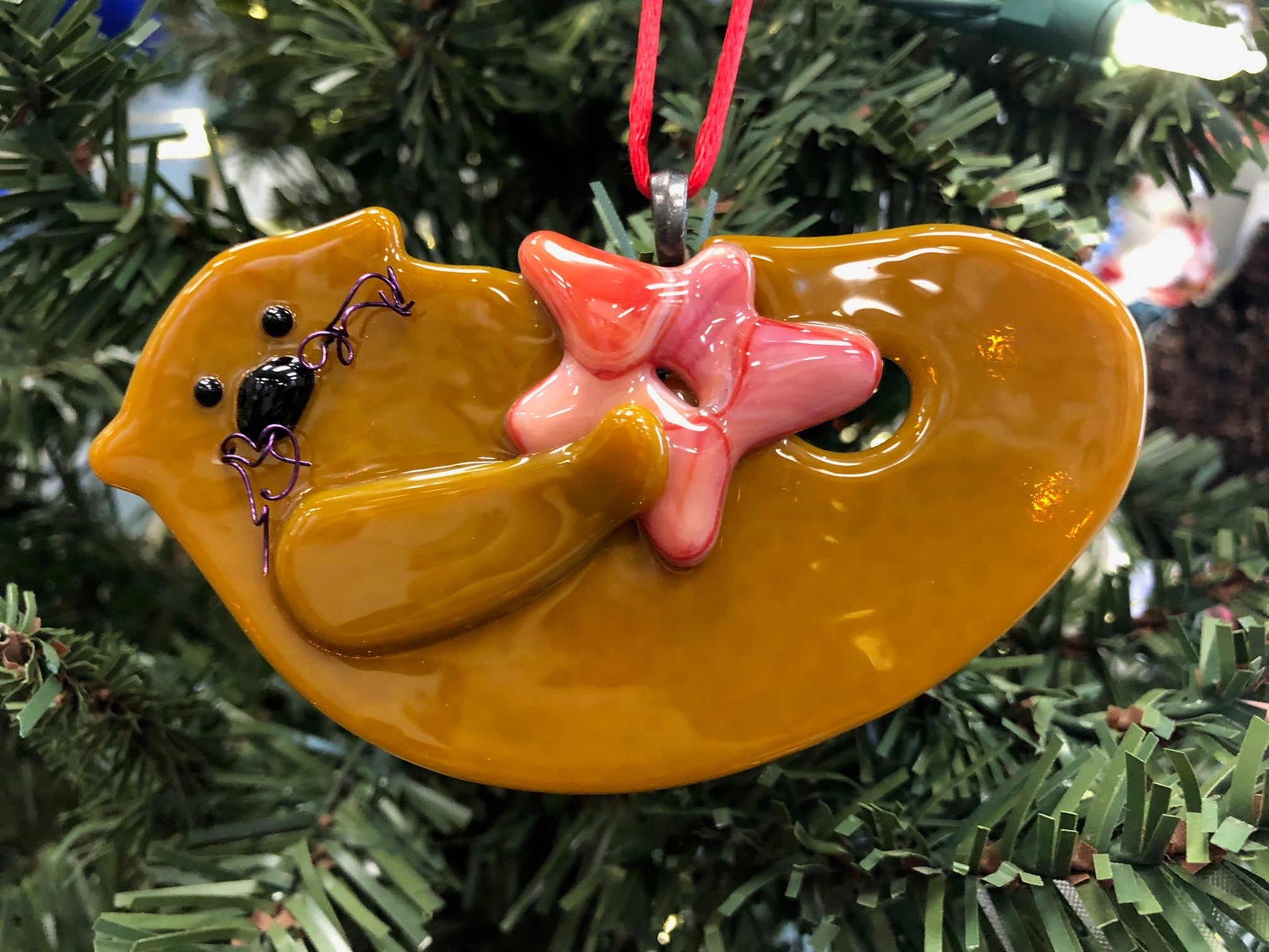 SEA OTTER ORNAMENT BUTTERSCOTCH